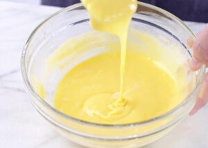 egg yolks beating for lemon pudding